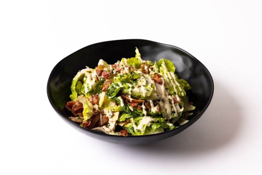 Coz lettuce, eggs, parmesan cream, and bacon 