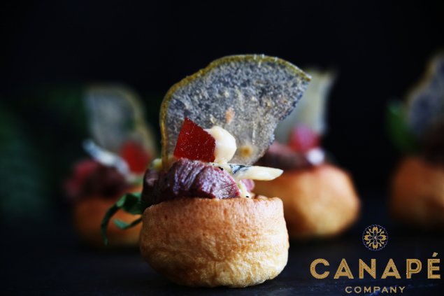 Yorkshire puds rare beef fillet horseradish crispy pear quince blue cheese
