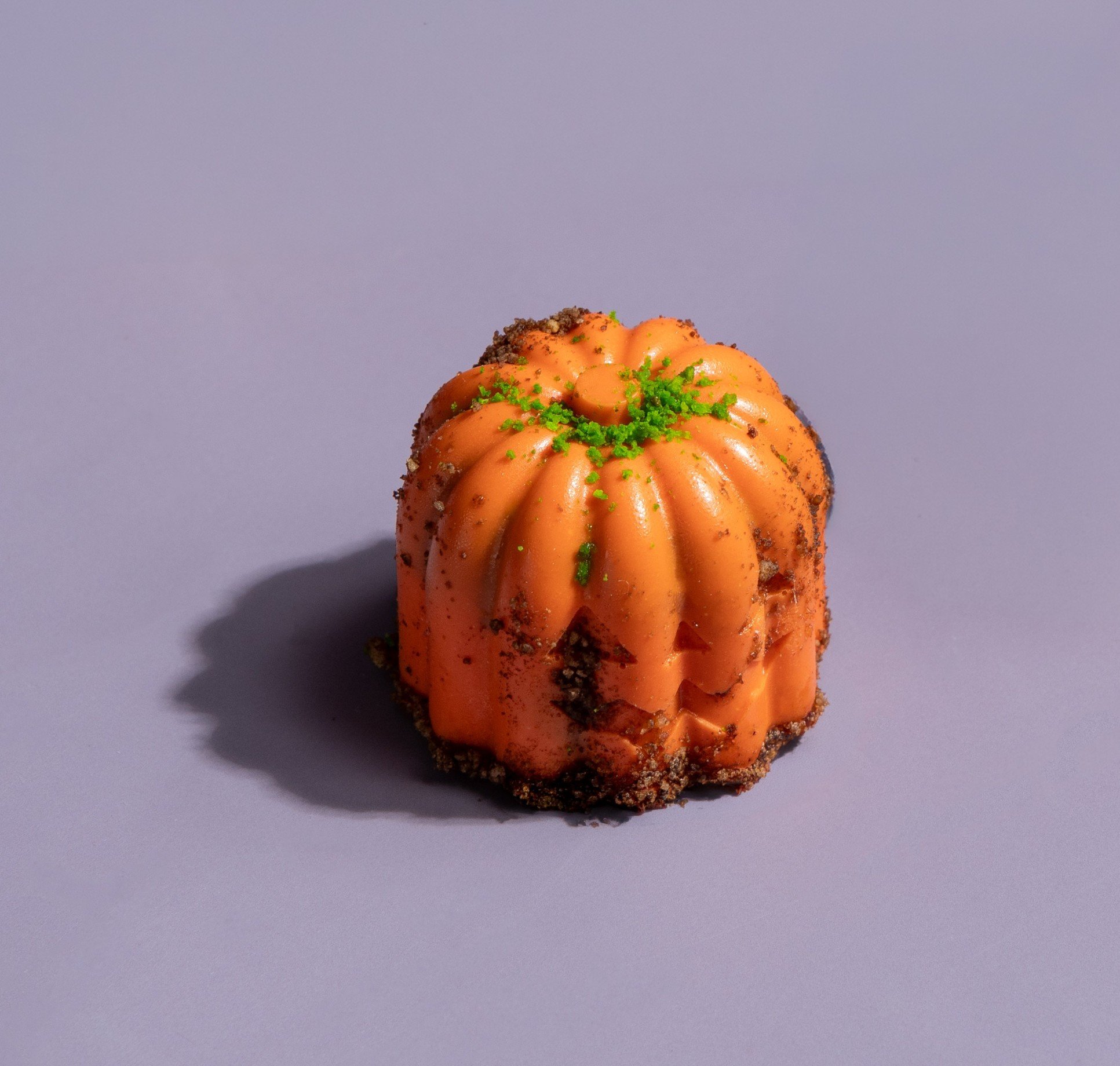 Orange bite size sweet pumpkin shaped dessert