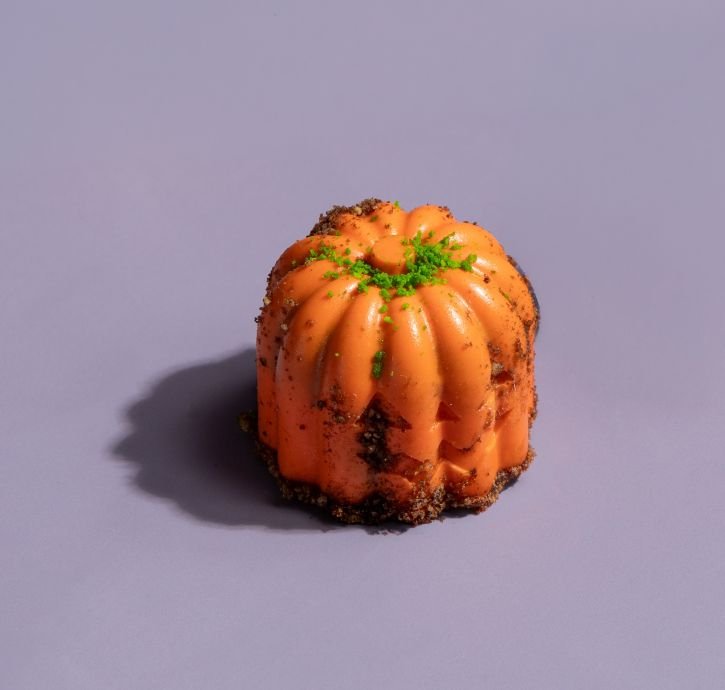 Orange bite size sweet pumpkin shaped dessert