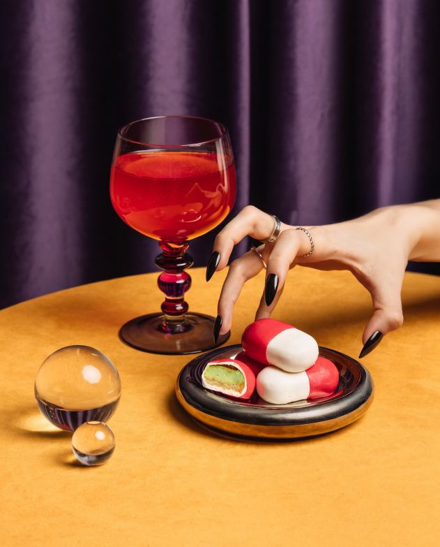 Oval Shaped dessert half red, half white like a pill
