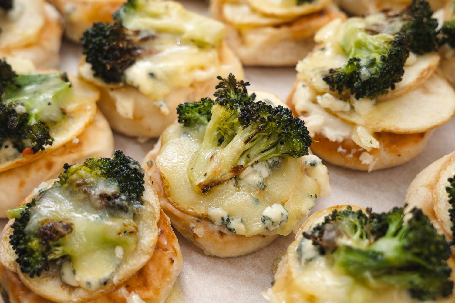 Pizza Bites, Charred Broccoli, Potato Gorgonzola, White Sauce, Mozzarella 