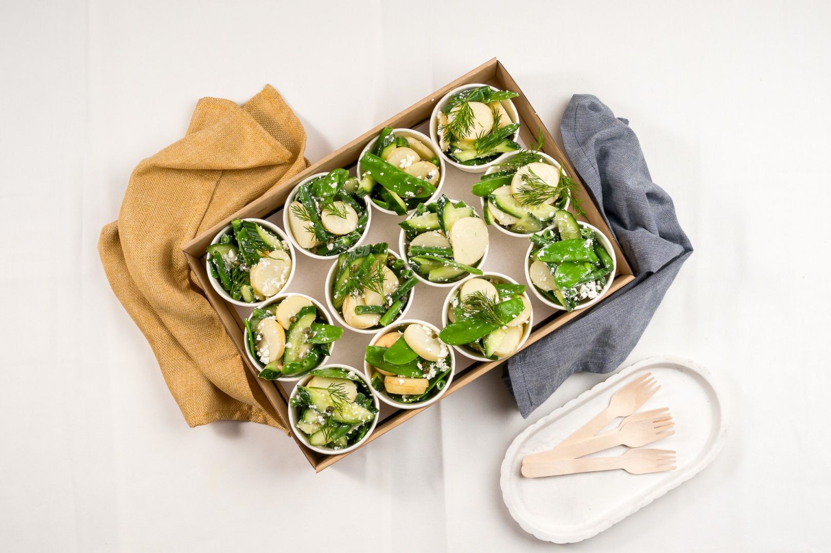 Chat Potatoes & Greens Salad Mini Cup, Snow Peas, Green Beans, Cucumber, Baby Capers, Dill, Feta Cheese, Hot English Mustard And Lemon Vinaigrette