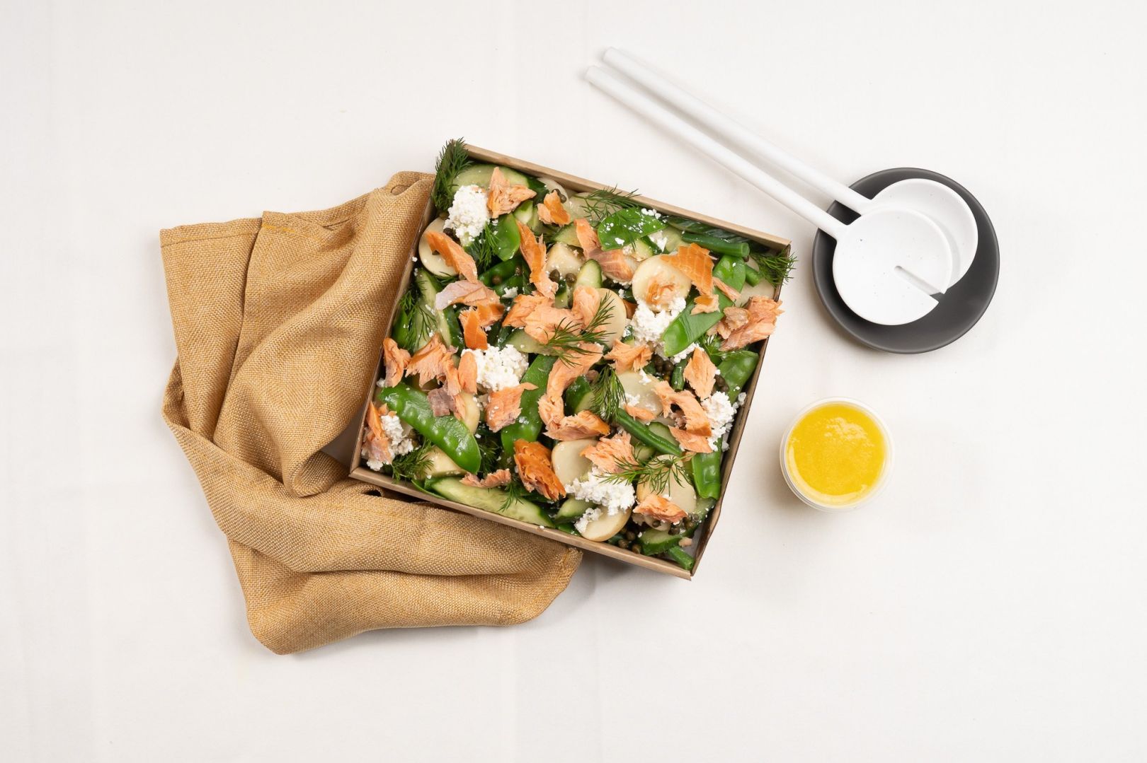 Flaked Hot Smoked Salmon Salad, Chat Potatoes & Greens Salad, Snow Peas, Green Beans, Cucumber, Baby Capers, Dill, Feta Cheese, Hot English Mustard And Lemon Vinaigrette