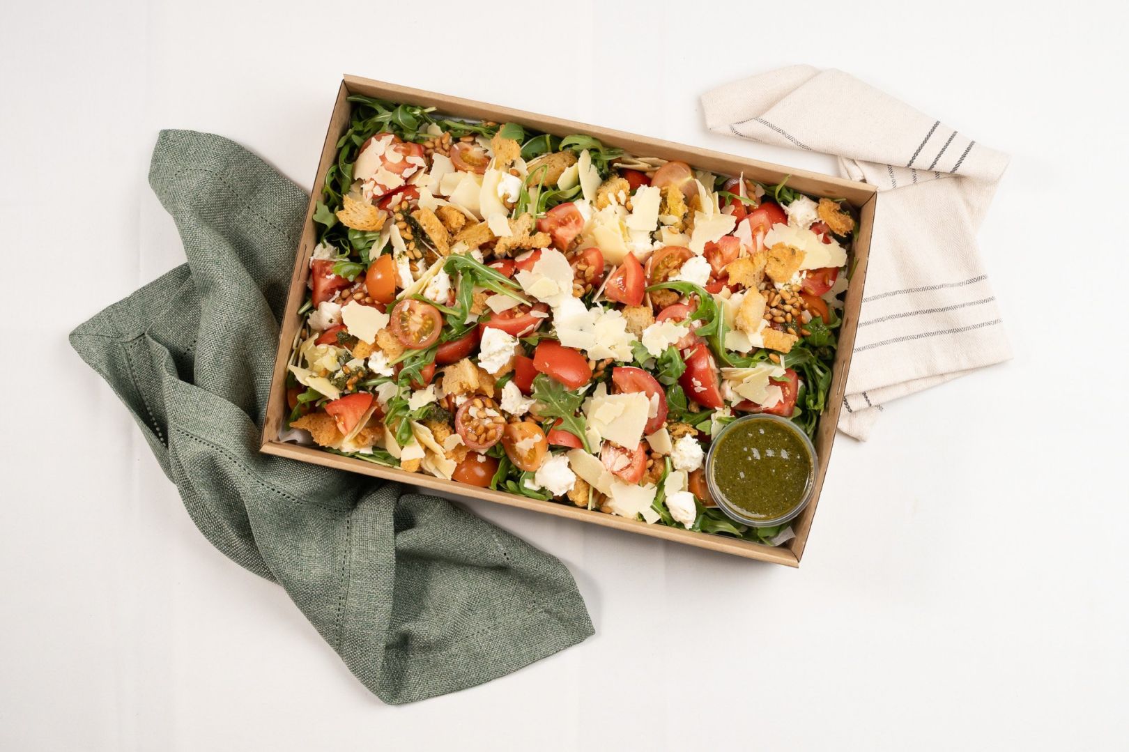 Rustic Tomato & Bocconcini Salad, Roquette, Basil Pesto, Croutons, Toasted Pine nuts, Parmesan & Olive Oil