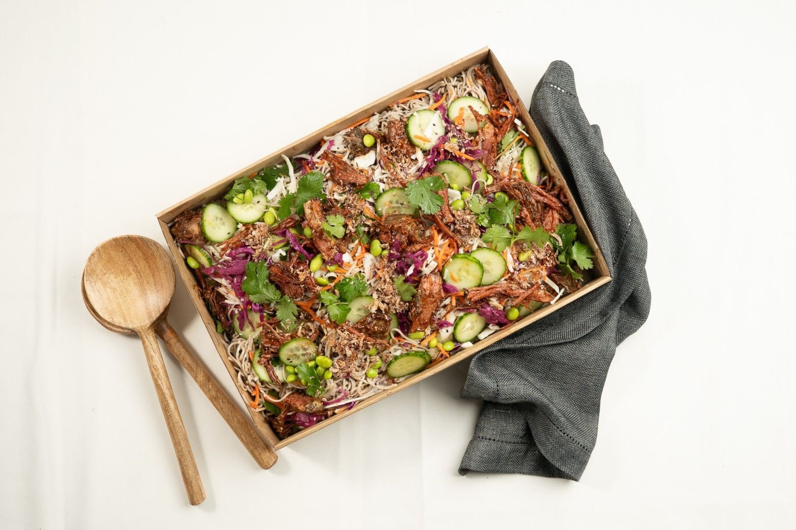 Pulled Marinated Beef Brisket Soba Noodle Salad, Pickled Red Cabbage, Carrot, Cucumber, Edamame, Crispy Shallots, Sesame Seeds & Coriander With Soy and Mirin Dressing