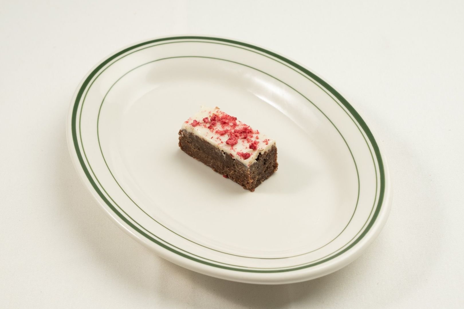 Gluten Free Fudge Brownie Slice, White Chocolate Ganache, Freeze-Dried Strawberry