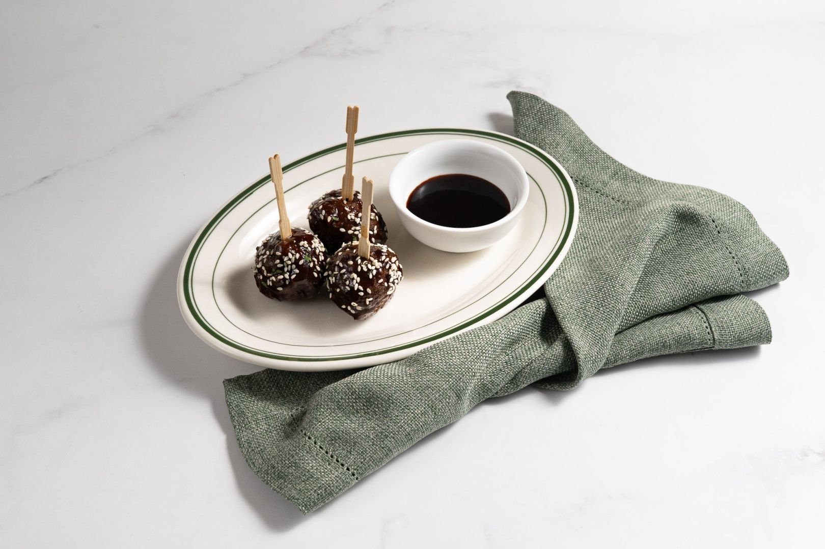 Hoisin-Glazed Beef Meatball Bites, Garnished with Sesame Seeds