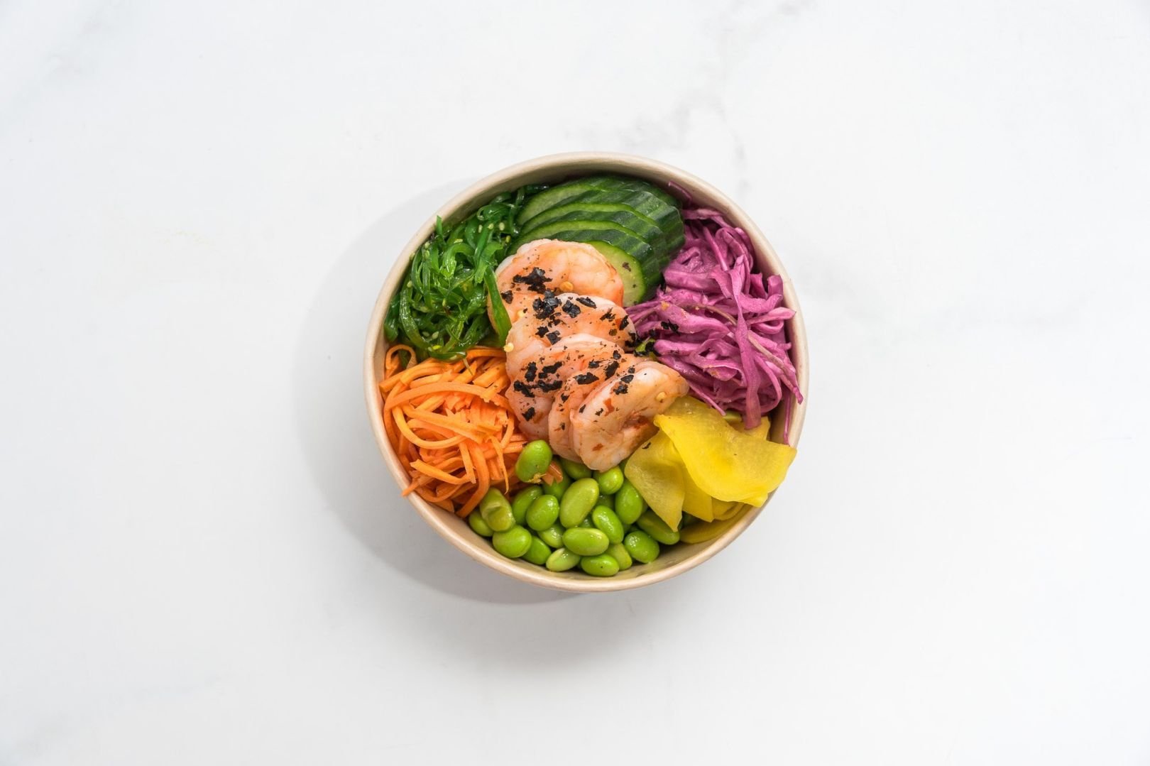Protein Poke Bowl, Soy and Nori Brown Rice, Pickled Carrot, Wakame, Edamame, Pickled Red Cabbage, Cucumber, Radish, and Pickled Ginger 