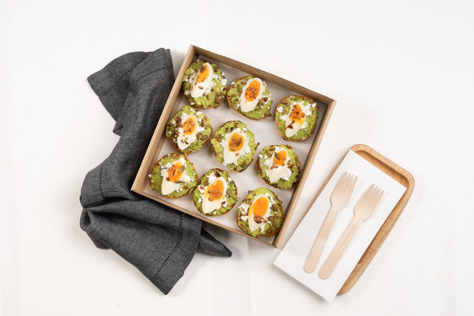 Vegetarian Fritter Box - Smashed Avocado, Boiled Egg, Crumbled Feta And Toasted Seeds