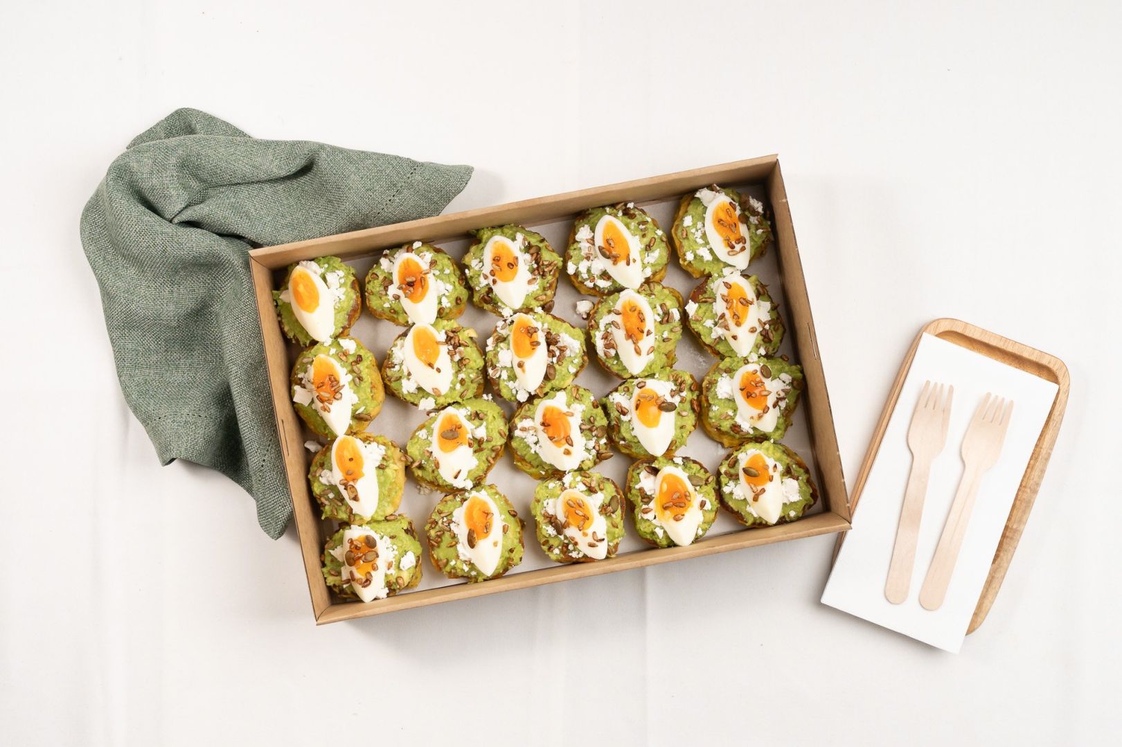 Vegetarian Fritter Box - Smashed Avocado, Boiled Egg, Crumbled Feta And Toasted Seeds