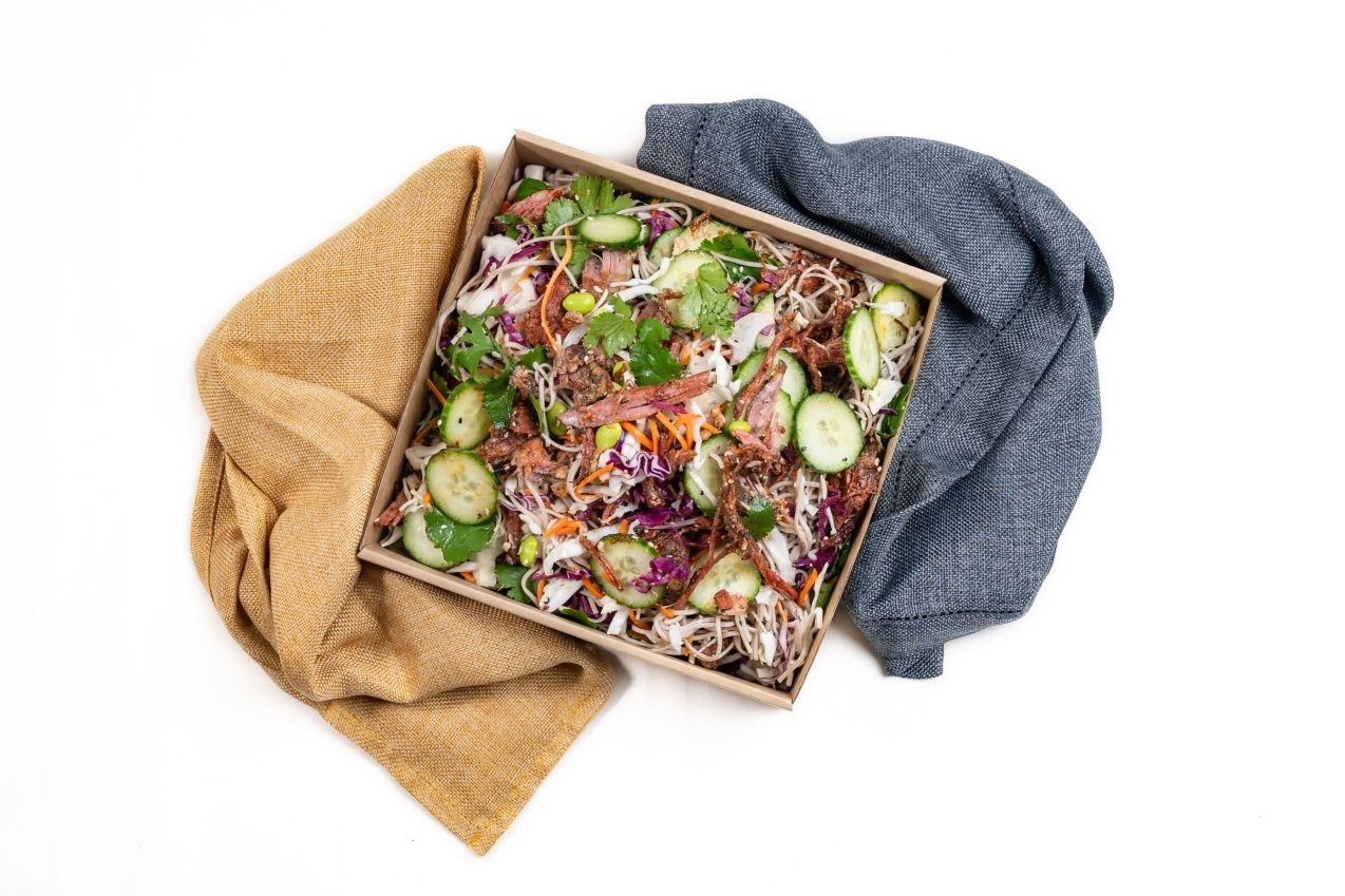Pulled Marinated Beef Brisket Soba Noodle Salad, Pickled Red Cabbage, Carrot, Cucumber, Edamame, Crispy Shallots, Sesame Seeds & Coriander With Soy and Mirin Dressing