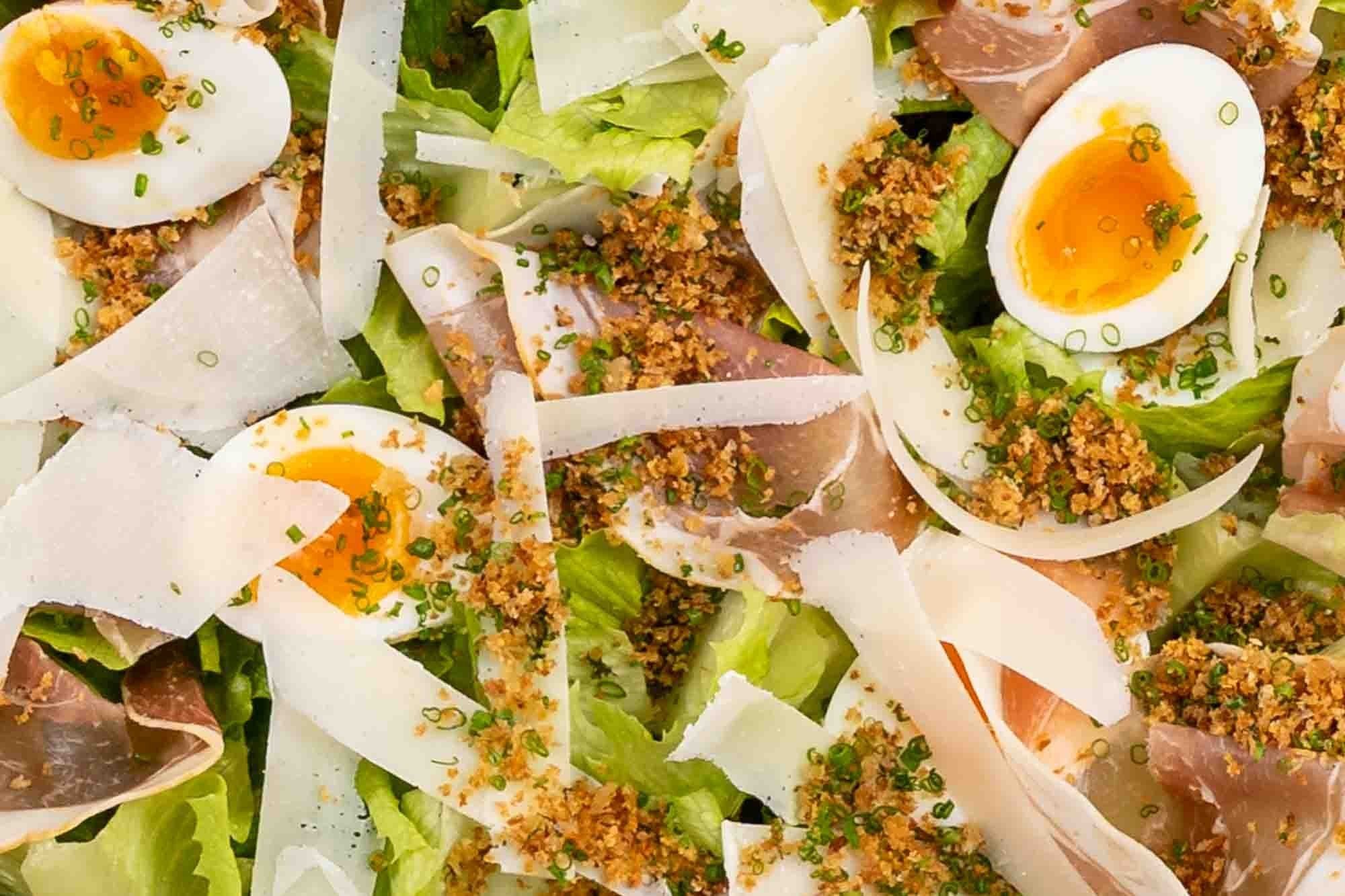 Caesar Salad, Cos Lettuce Hearts, Soft Boiled Egg, Shaved Parmesan, Freshly Sliced Prosciutto, Pangrattato Crumb, Caesar Dressing