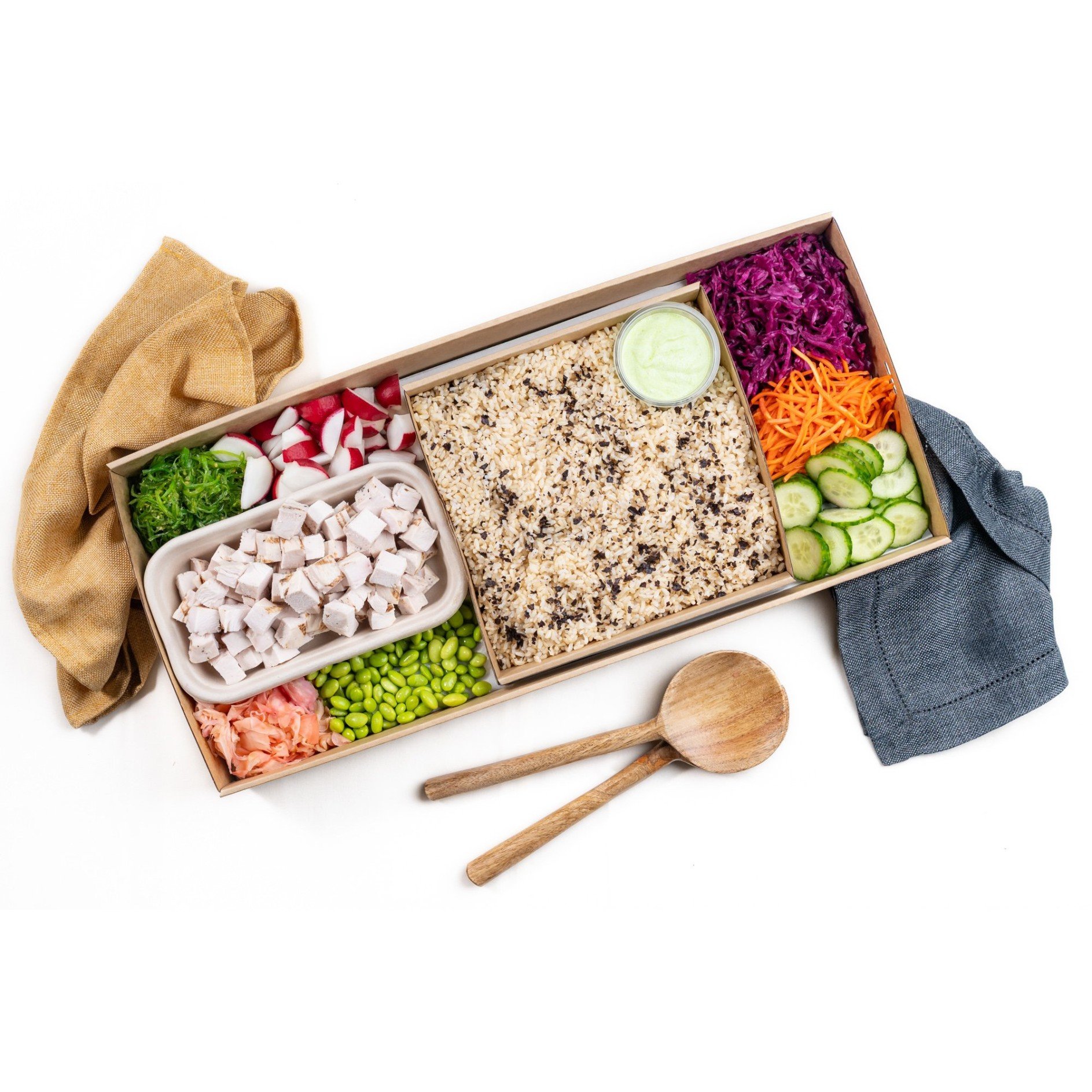 Protein Poke Box, Soy and Nori Brown Rice, Pickled Carrot, Wakame, Edamame, Pickled Red Cabbage, Cucumber, Radish, and Pickled Ginger / Feeds 12 - 15