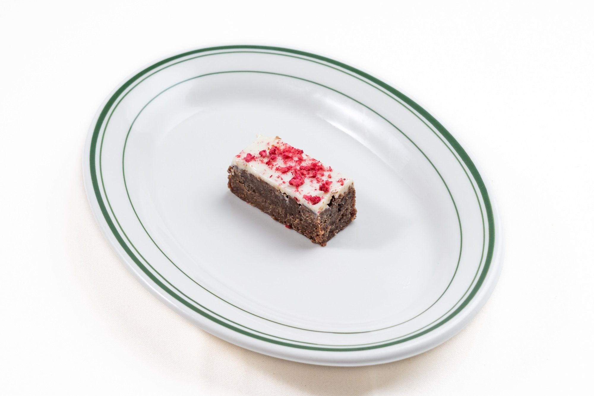 Gluten Free Fudge Brownie Slice, White Chocolate Ganache, Freeze-Dried Strawberry