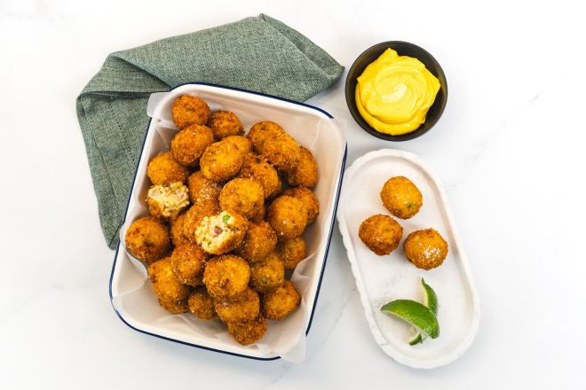 Paella Bombs Filled with Chicken, Seafood and Chorizo. Served with Saffron Aioli