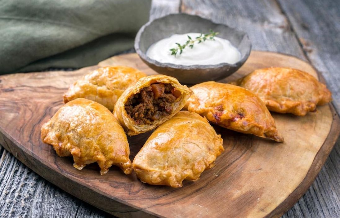 Chorizo Empanada with Sour Cream