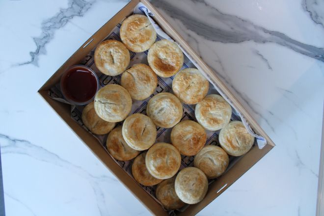 Gourmet Pies Served With Tomato Sauce