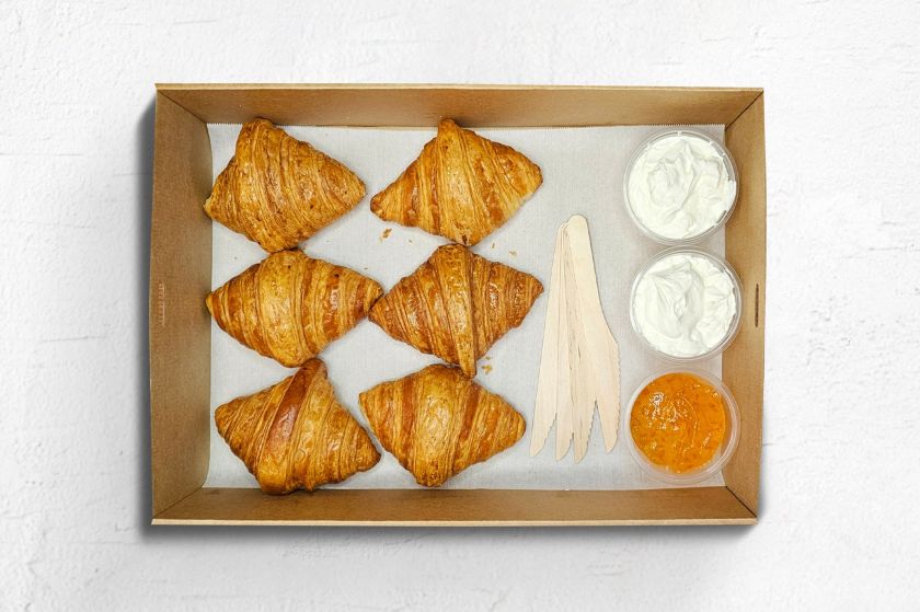 Mini croissants served with jam and cream