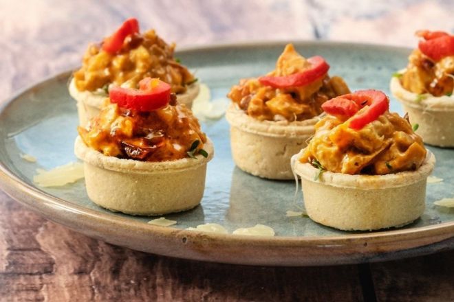 HARISSA SPICED CHICKEN canape tartlet with chicken, harissa & sour cream