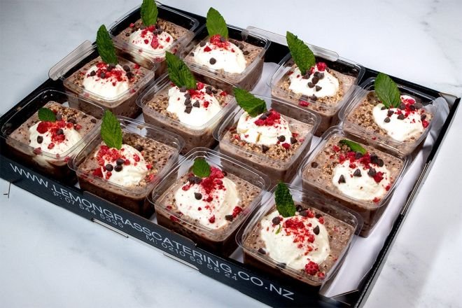 OVERNIGHT OATS Chocolate with greek yoghurt & topped with freeze dried raspberries - served with wooden spoons