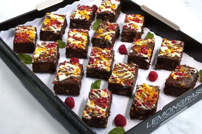 TRIPLE CHOCOLATE & WALNUT BROWNIE PLATTER topped with white & dark chocolate drizzled and freeze dried raspberries - Our Signature Bake