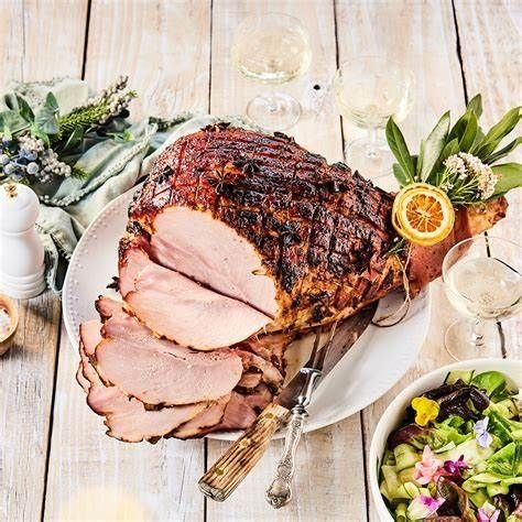 CHAMPAGNE HAM WHOLE - Glazed with brown sugar, mustard & sherry, Hot & carved. Served with a tub of cranberry jelly (GF, DF)