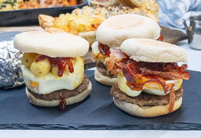 MUFFIN STACK - English muffin stack loaded with beef pattie, double eggs, bacon, BBQ sauce - hot & individually wrapped in foil