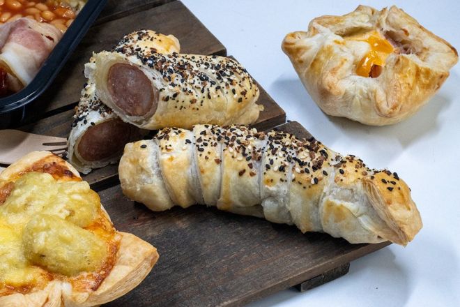 BIG BOY SAUSAGE ROLLS - flakey pastry twirled around big boy sausages & baked with a side tub of tomato sauce - hot