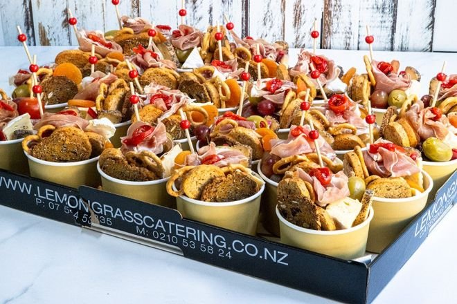 CHARCUTERIE BOWLS - Selection of fine cured meats, artisanal cheeses, fresh fruits, antipasti and crispy crackers served in individual bowls 