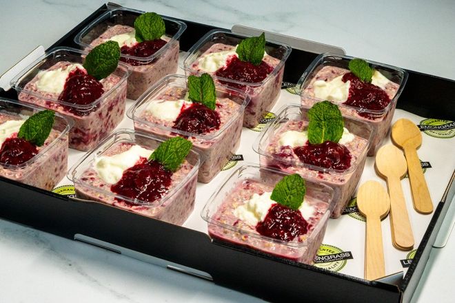 OVERNIGHT OATS Berry with housemade Berry Coulis and Yoghurt - served with wooden spoons