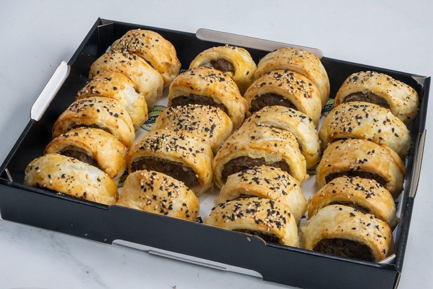 SAUSAGE ROLL PLATTER (22) Cold - Our signature beef, sage & onion recipe. Cocktail size - Sunday Catering 