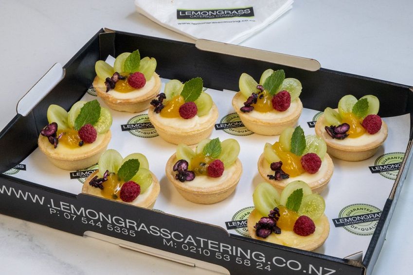 FRUIT TARTS WITH CREME PATISSIERE PLATTER (12) - topped with seasonal fresh fruit & passionfruit compote in 60mm tart shell