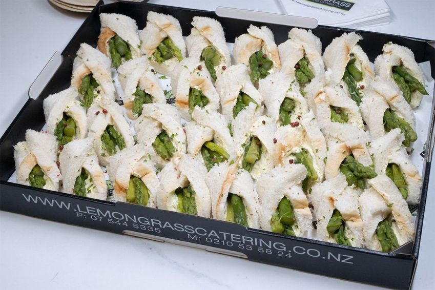 ASPARAGUS ROLL BITES - 30 bites per platter - crustless white bread, dill cream cheese & coarse grain mustard (V)