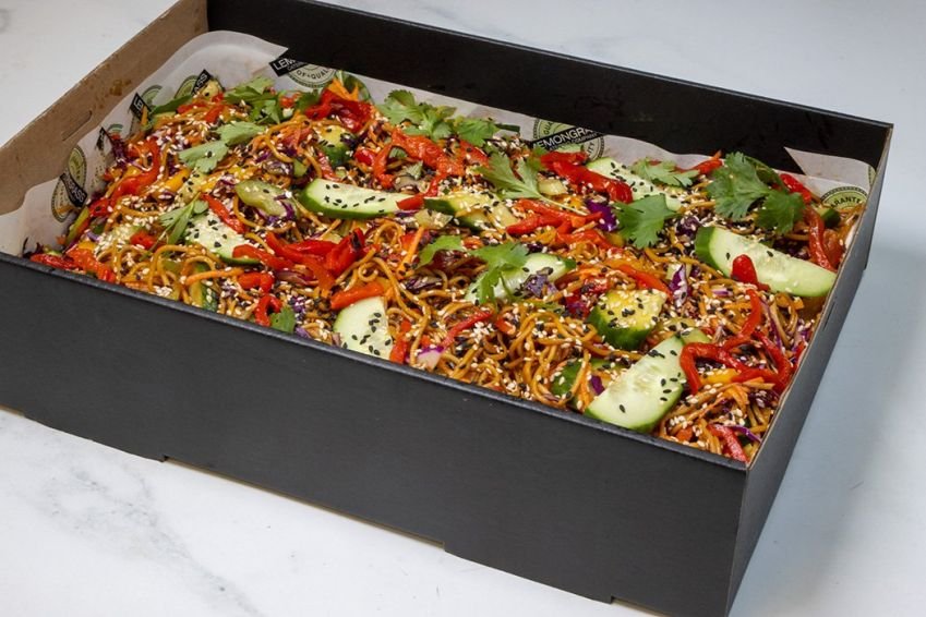 THAI NOODLE SALAD BOX - Sesame, soy & ginger dressing tossed through egg noodles, shredded vegetables - red & white cabbage, capsicum, carrots, celery, fresh salad greens & finished with toasted sesame seeds (V,DF)
