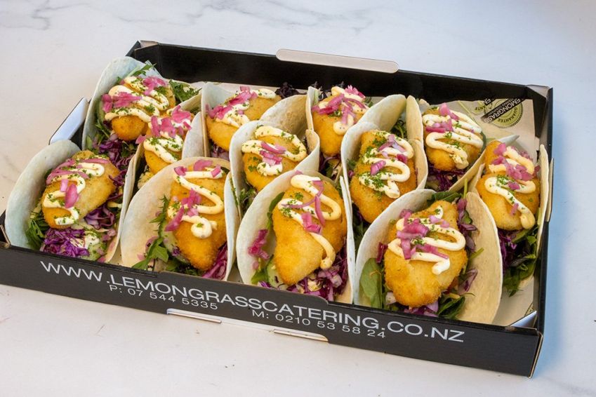 CHICKEN TACO PLATTER - 12 - Crumbed chicken fillets with fresh salad greens, grated cheese, shredded cabbage, carrot honey mustard mayo sauce toasted seeds in soft tacos - Room temp