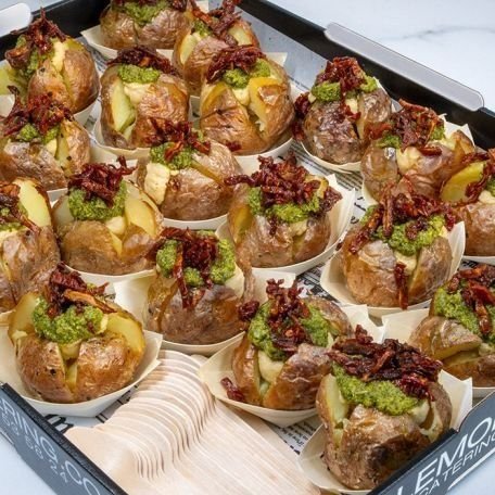 BABY GOURMET BAKED STUFFED POTATOES Canape Platter - 18 -  topped with hummus, vegan basil pesto & diced sundried tomatoes served in individual bamboo boats with wooden forks (GF, DF, Vegan) served warm 