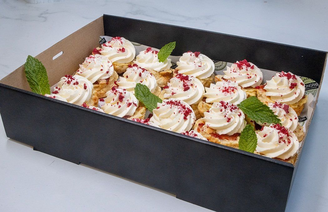 SCONE HALVES (20) WITH JAM & FRESH WHIPPED CREAM sprinkled with freeze dried raspberries & presented in box with lid 