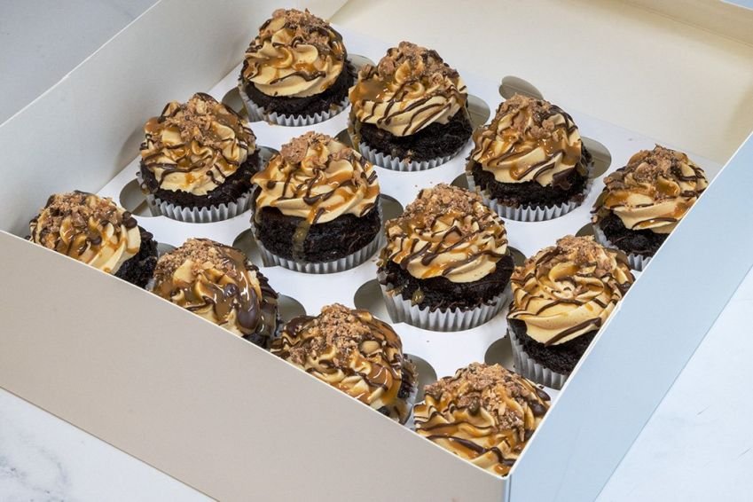 CHOCOLATE AND SALTED CARAMEL CUPCAKE BOX (12) - Chocolate cupcake with salted caramel filling topped with salted caramel buttercream icing - in a cupcake box with lid 