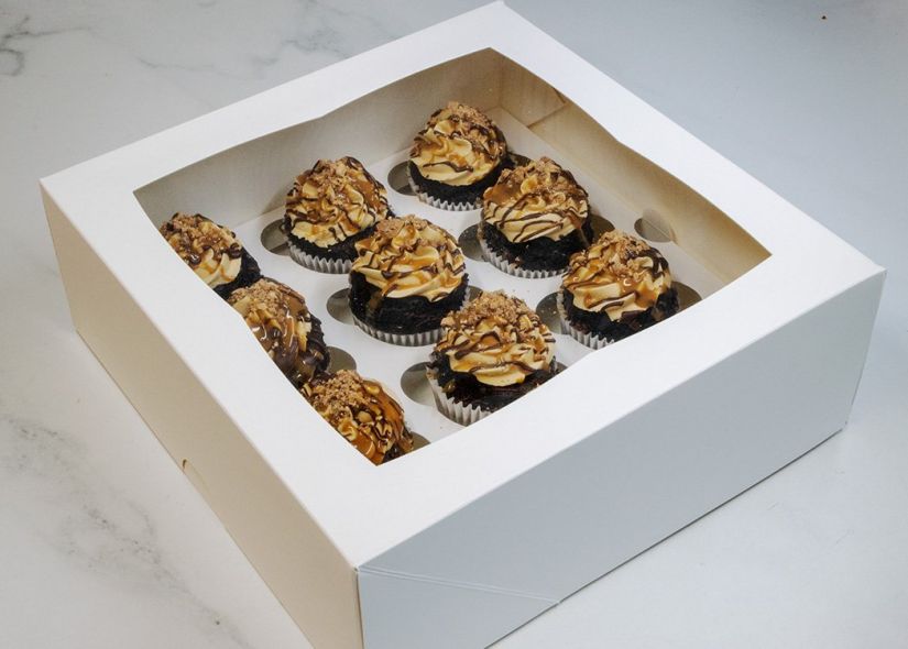 CHOCOLATE AND SALTED CARAMEL CUPCAKE BOX (12) - Chocolate cupcake with salted caramel filling topped with salted caramel buttercream icing - in a cupcake box with lid 