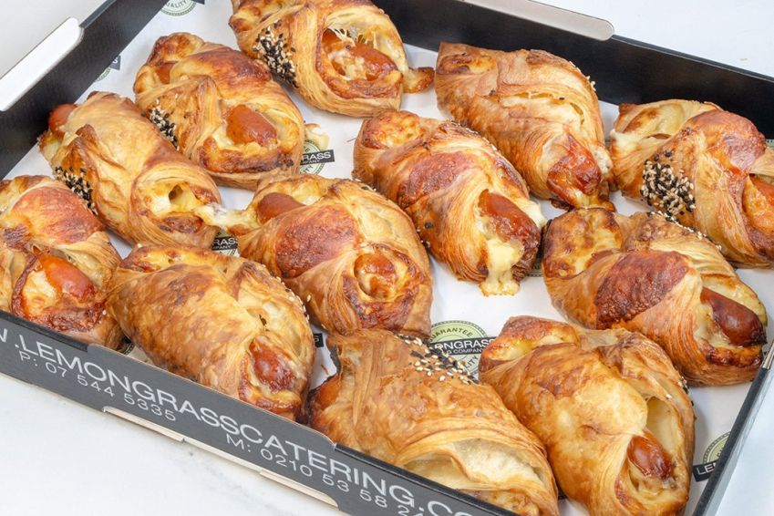 DANISH PASTRY KRANSKY SAUSAGE TURNOVER with  cheese & mustard - wrapped in danish pastry topped seeds - hot