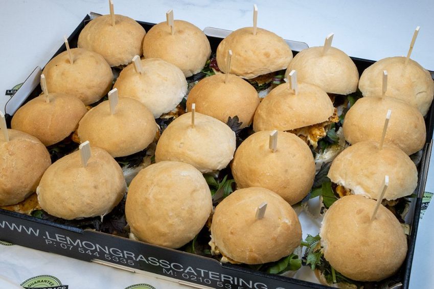 CHICKEN BRIE & CRANBERRY SLIDER - marinated chicken tender, fresh salad greens, brie cheese, cranberry sauce & mayo - served warm 