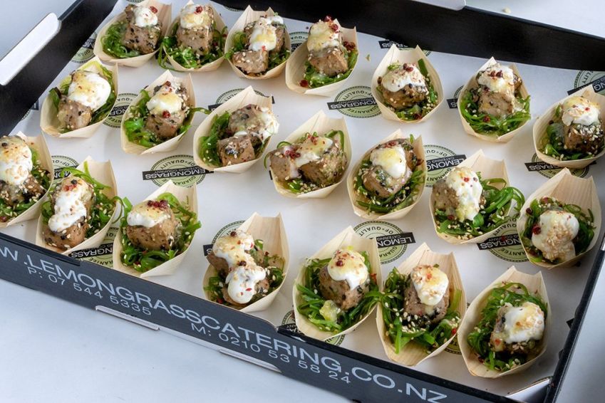 SEARED TUNA with Wakame salad and zesty lemon dressing in mini bamboo boats with wooden forks  - GF, DF