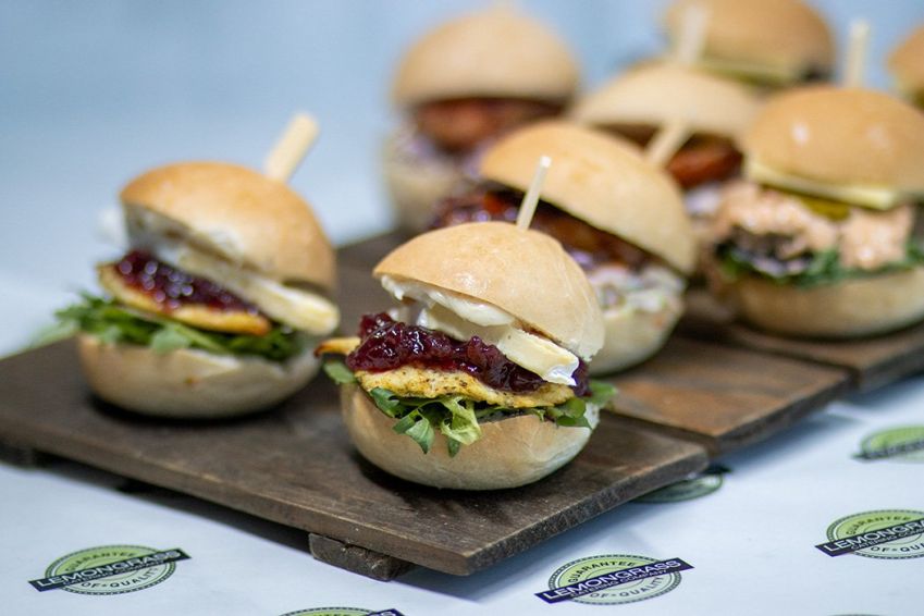 CHICKEN BRIE & CRANBERRY SLIDER PLATTER - 15 - marinated chicken tender, brie cheese, cranberry sauce, mayonnaise and fresh salad greens - served warm 