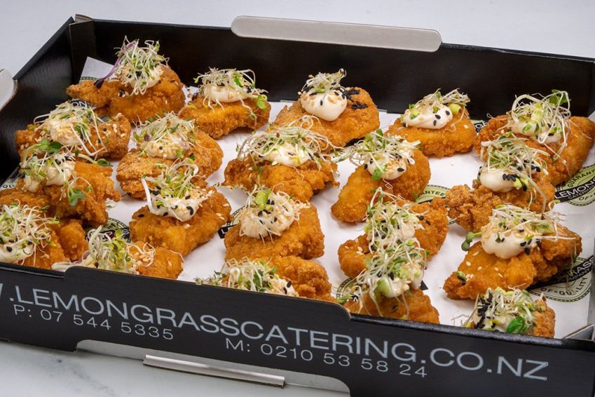 KARAAGE CHICKEN BITES Canape Platter - 20 - topped with roasted sesame mayonnaise, crushed wasabi peas & black sesame seeds - served cold 