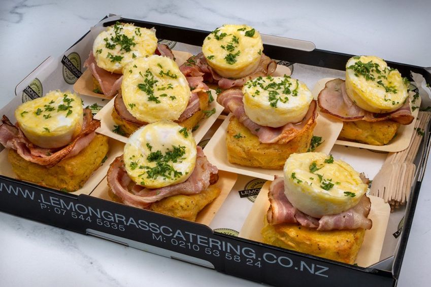 POTATO HASH SAVOURY with bacon, egg & cheese (GF) served on small bamboo plates with wooden forks 