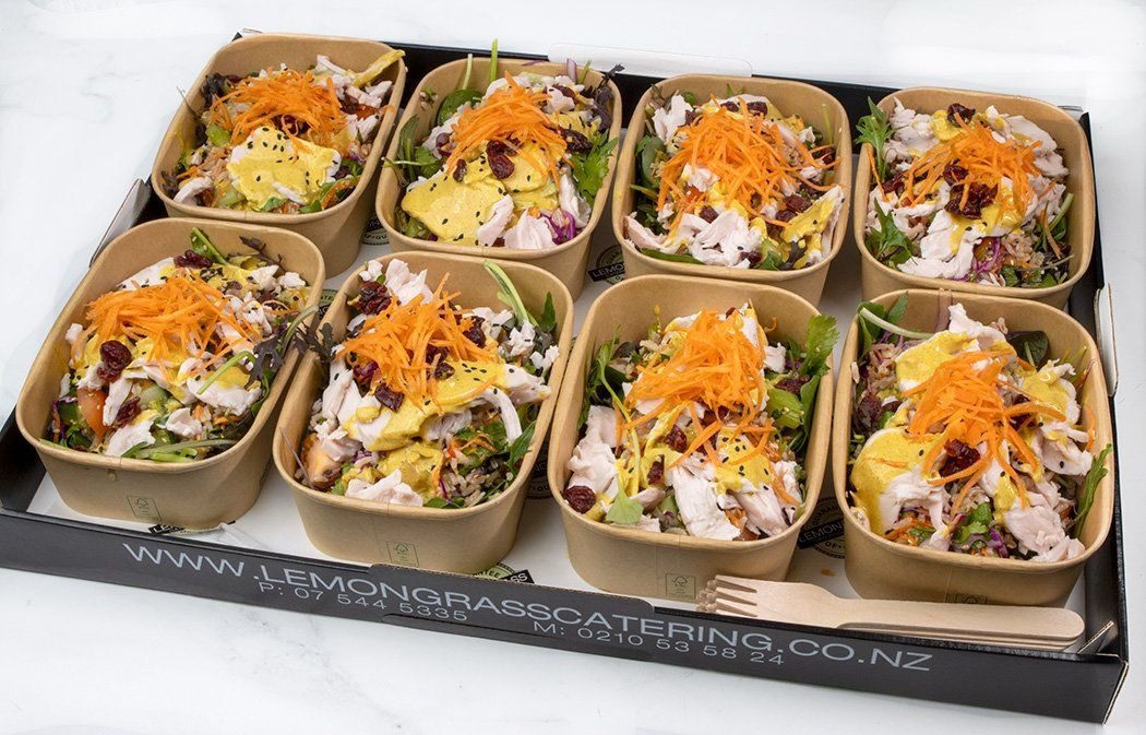 CHICKEN AND BROWN RICE SALAD with Fresh vegetables & seasonal greens, edamame beans, zesty asian dressing & toasted seeds served in individual medium size rectangle salad dish with lid & wooden forks (GF,DF)