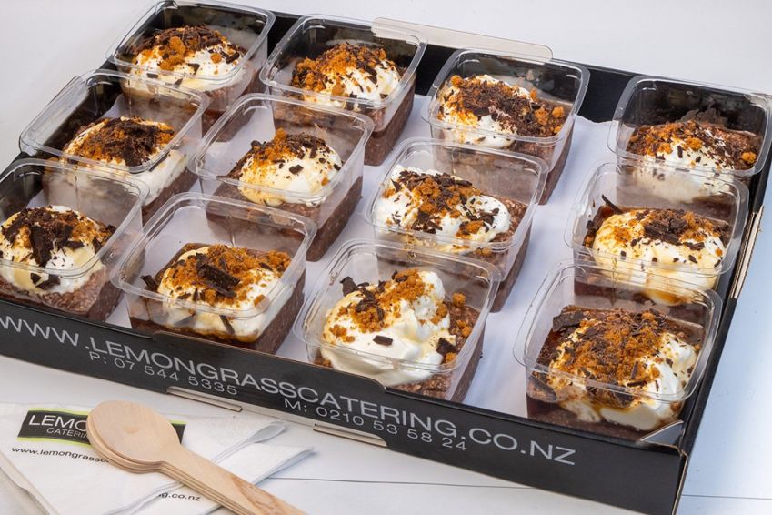 OVERNIGHT OATS Chocolate with greek yoghurt & topped with freeze dried raspberries - served with wooden spoons