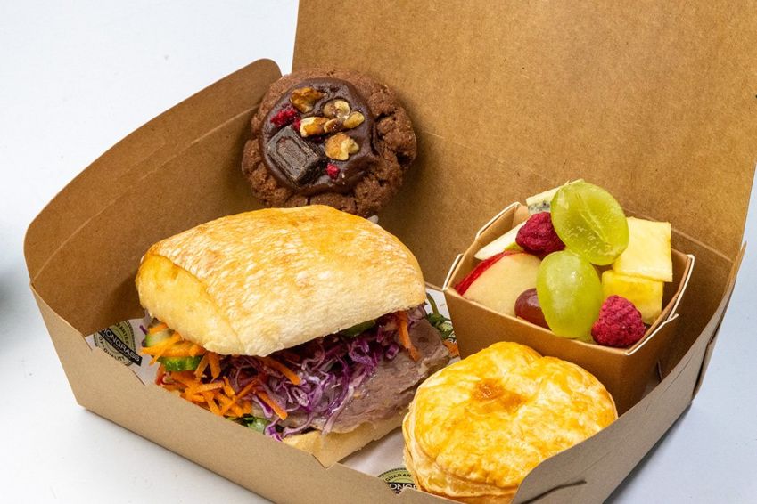 KIWI FAVOURITES PICNIC BOX (Large filled roll, Bacon & egg pie, Daily Sweet, Fresh fruit served in noodle box) 