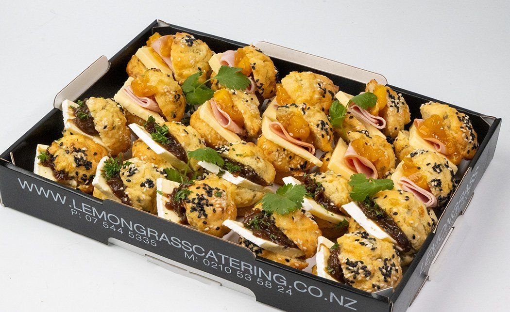 MINI SAVOURY MUFFIN PLATTER - 20 - Brie & caramelized onion relish (10). Ham, cheddar cheese & mango relish (10)